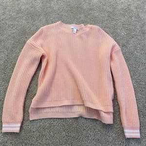 light orange sweater